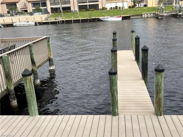 This 2 bedroom/2 bath first floor condo comes with assigned dock, just outside your door.