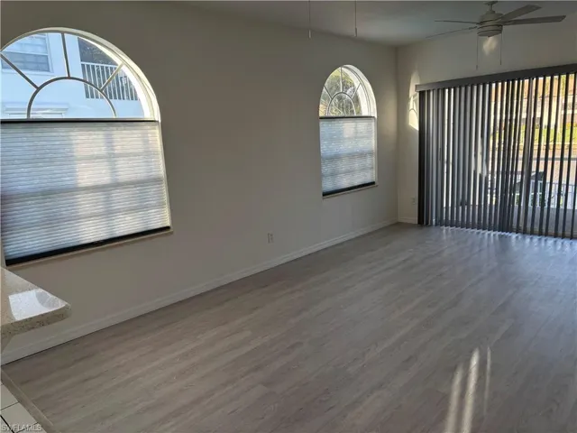 New custom cellular shades throughout are cordless for ease of opening and closing for your privacy. The sliding glass doors both feature new easy open vertical blinds all coordinating with the new LVP flooring.