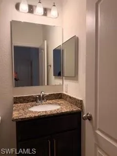 second masters  Room featuring tile flooring and neutral-toned walls