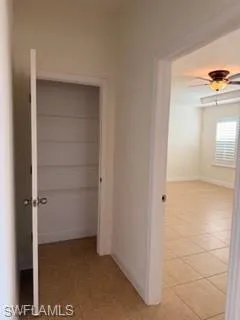 Built-in shelving within a dedicated storage closet