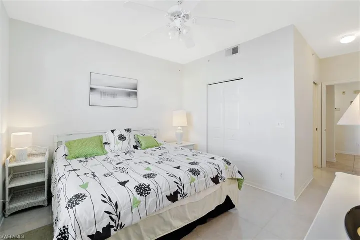 Bedroom with a closet and ceiling fan