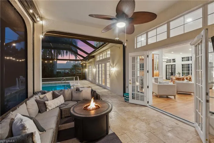 Sunroom featuring french doors