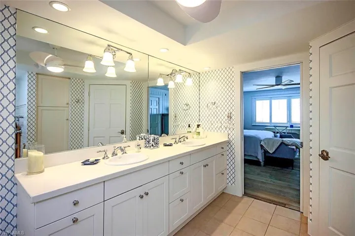 Ensuite bathroom with a double sinks