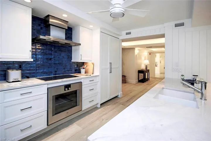 Recently remodeled kitchen with quartz counter tops, sub zero refrigerator enhance the prestige of the kitchen