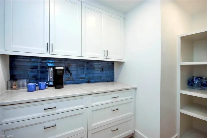 An extension to the kitchen is the matching butler's pantry, adds to prep area and storage for kitchen ware and small appliances