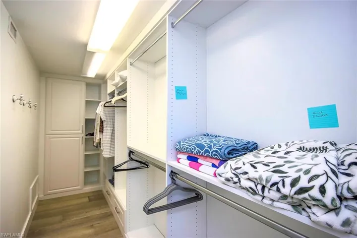 Custom designed primary walk in closet