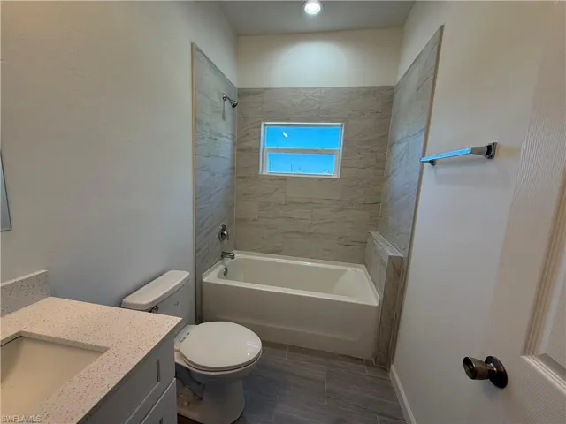 Full bath with vanity and  shower combination