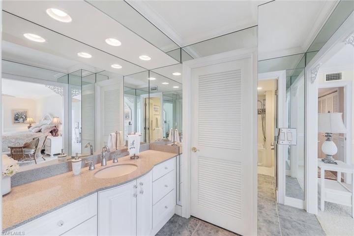 Primary ensuite bathroom with private water closet.