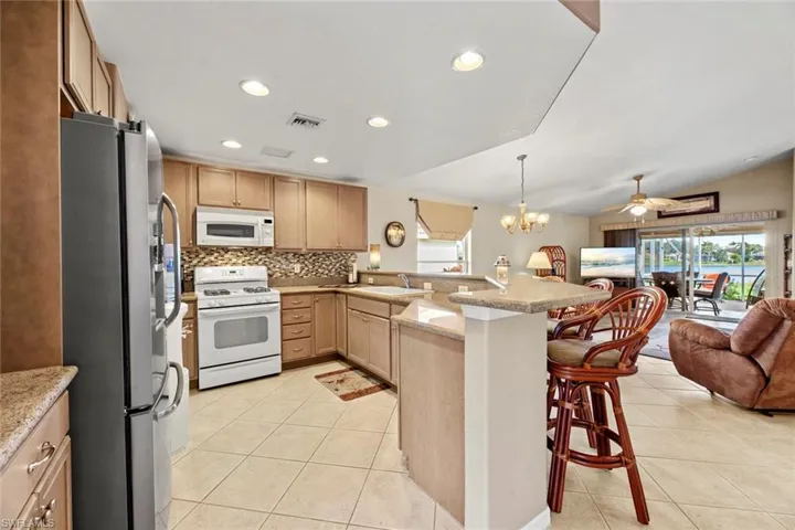 Granite counters, glass back splash