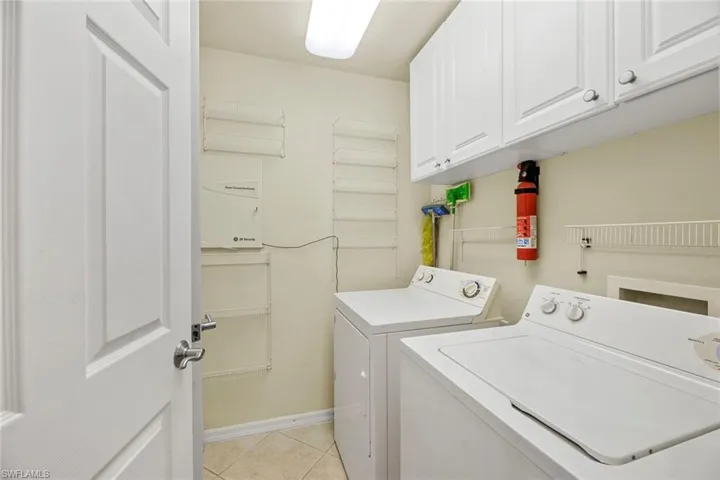 Laundry room, pantry behind door on left