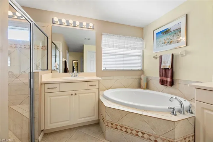 Large step-in shower to left