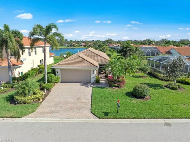 Welcome to 19647 Villa Rosa Loop, your lakefront escape!