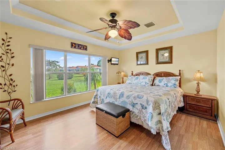 Master bedroom w/large window providing great view of lake