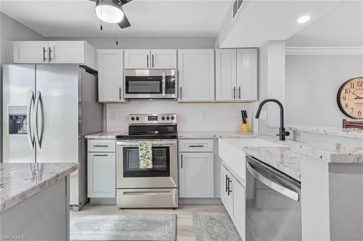 Granite counters ,large farmhouse sink, all soft close cabinetry
