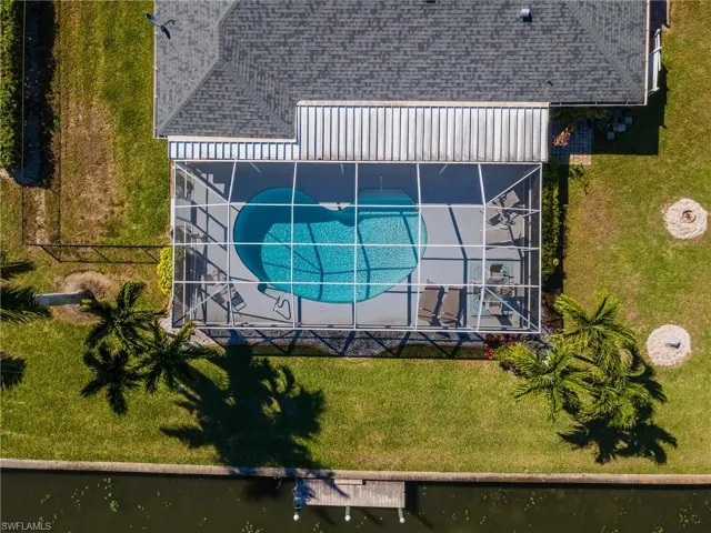 View from above of property with a pool area