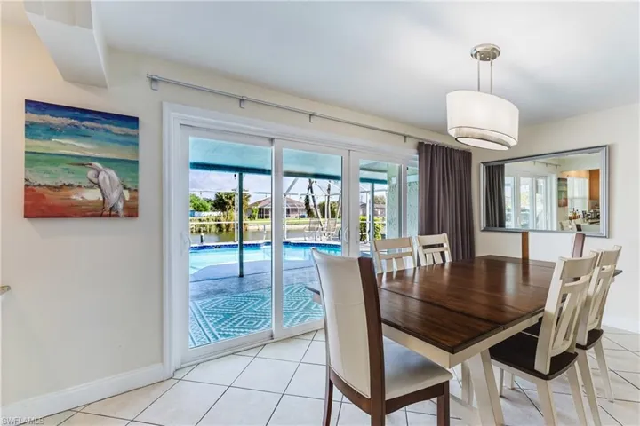 Dining room featuring light tile patterned floors