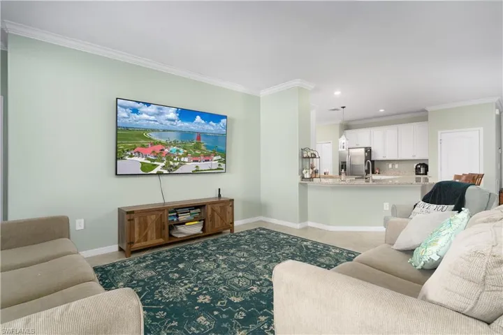 Living room featuring ornamental molding