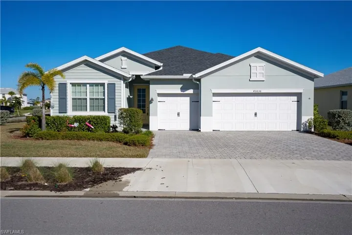 Ranch-style house with a garage