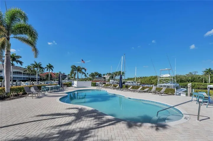 Community pool featuring a patio area
