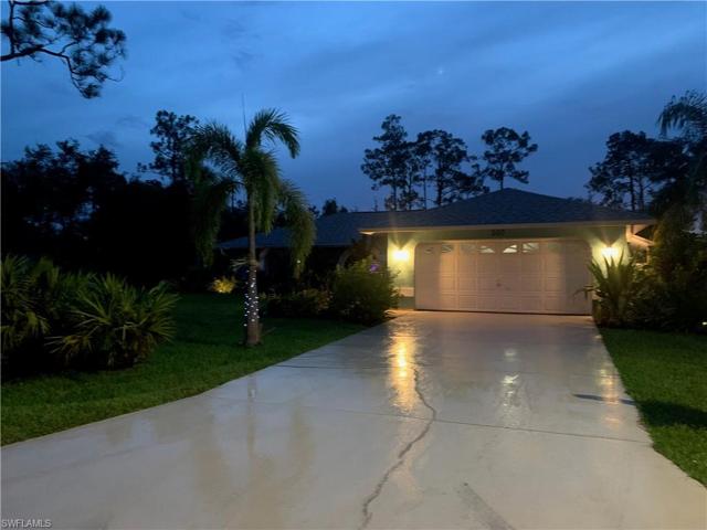 Solar & direct lighting create a warm & inviting outside yard
