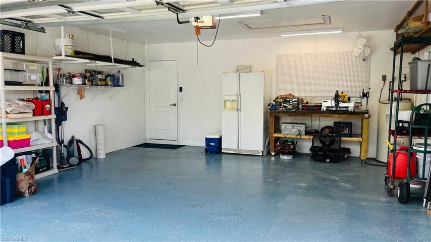 garage w/ lots of storage & new pull-down stairs to attic