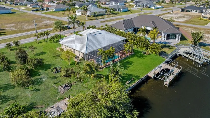 Bird's eye view with a residential view and a water view