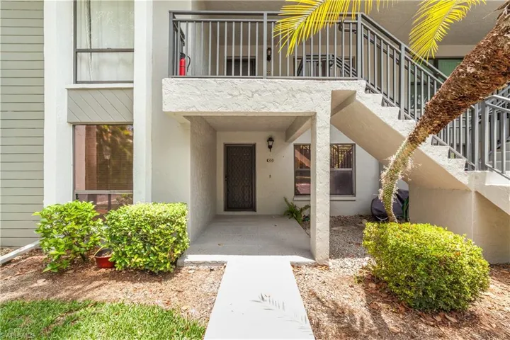 Doorway to property featuring a balcony