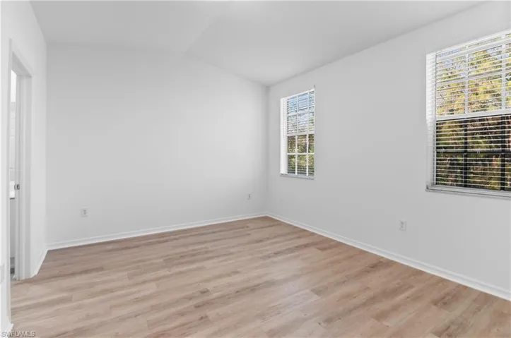 Master bedroom with view of preserve