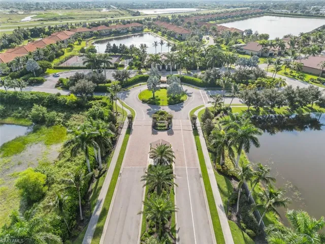 Aerial view with a water view and a residential view