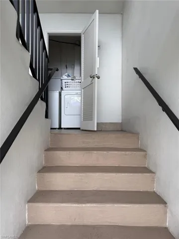 Stairs featuring washer / dryer