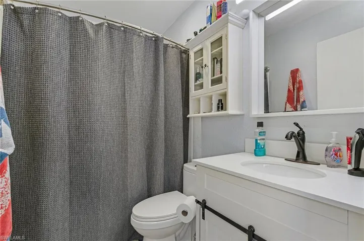 Bathroom featuring toilet and vanity