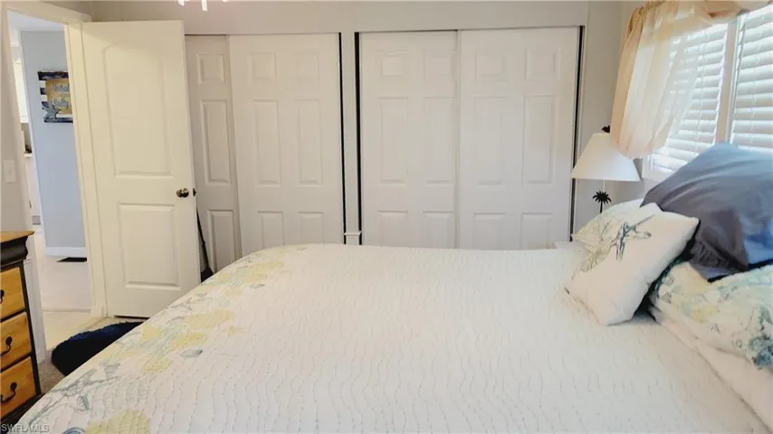 Bedroom featuring two closets