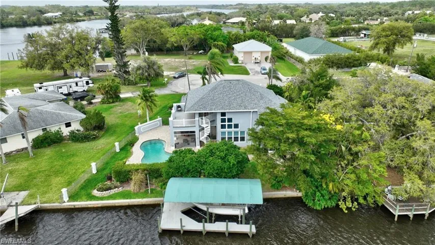 Bird's eye view of a large body of water and a tree filled landscape