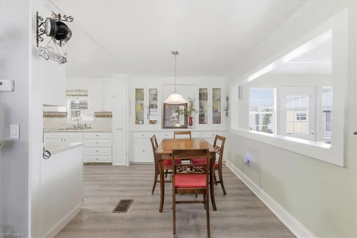 Dining space featuring light wood finished floors