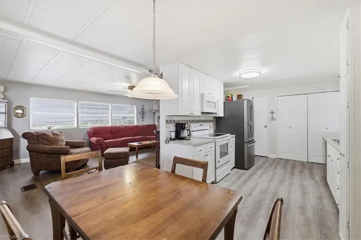 Dining area with light wood finished floors