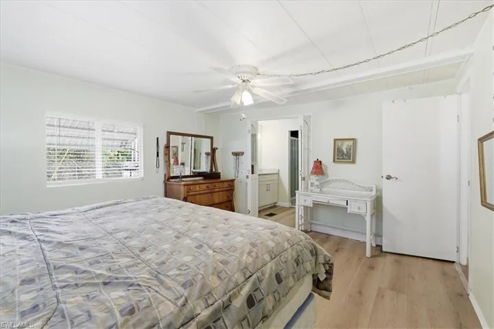 Bedroom featuring light wood-style floors and ceiling fan