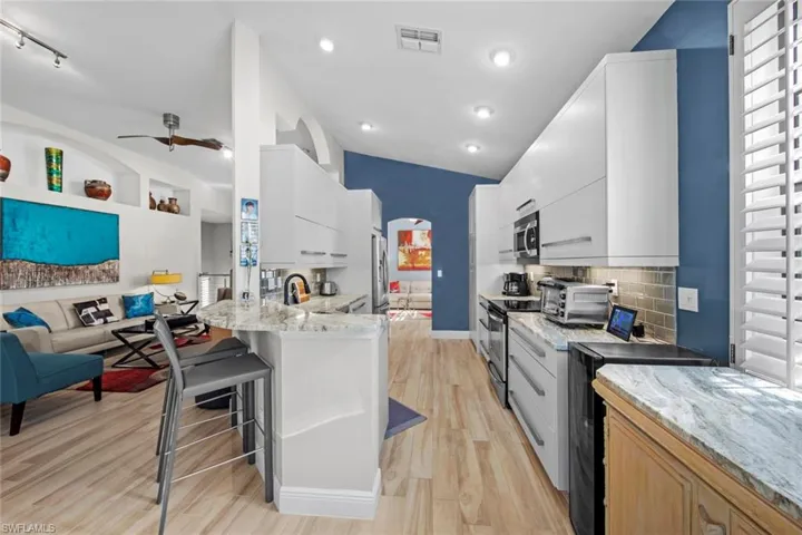 Kitchen seamlessly flows to living area