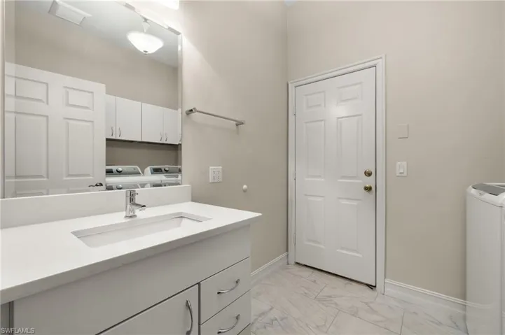 Half Bath and Laundry Room.