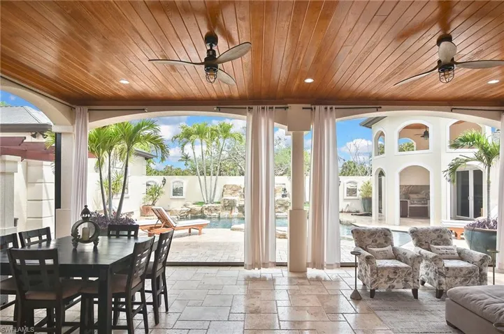 Main Level porch Screened or Screens up by a push of a button.
