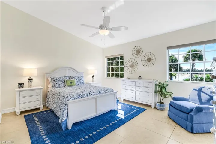 Tiled bedroom with ceiling fan, new black out blinds