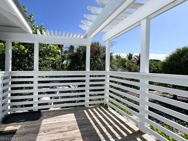 Wooden deck with a pergola