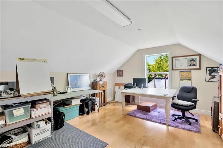 Office with River view above the single car garage
