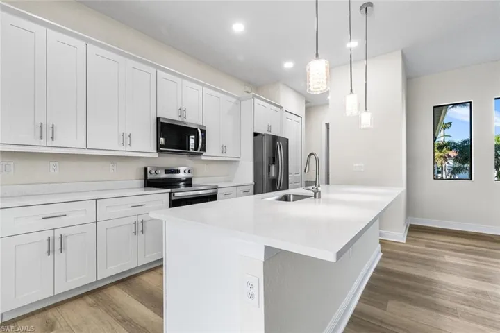 Large kitchen island with breakfast bar seating