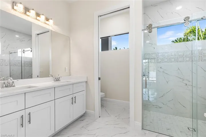 Master bath with separate water closet and walk-in shower