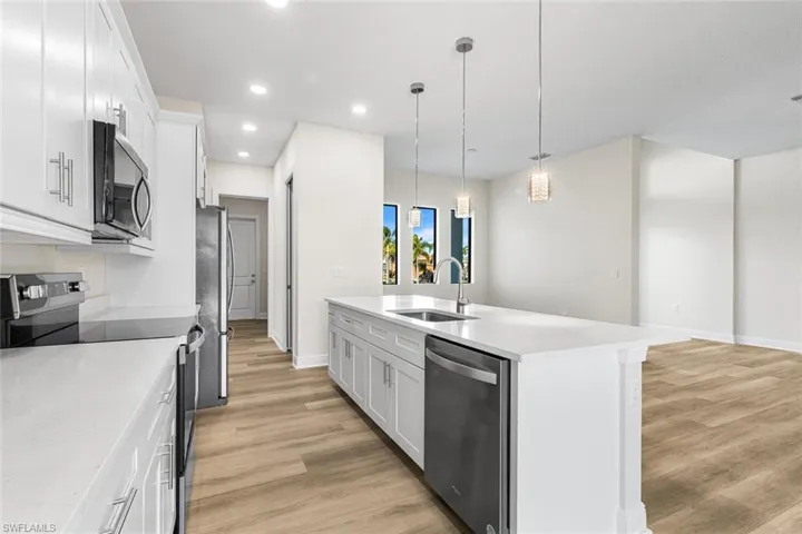 Stainless appliances and Quartz countertops