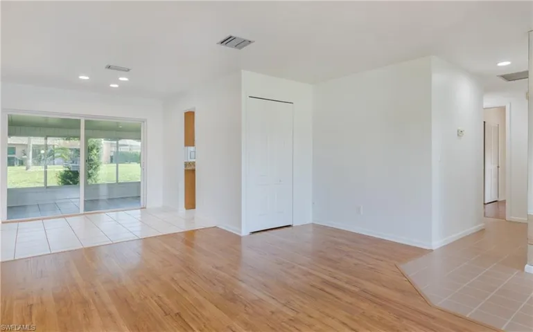 Spare room featuring recessed lighting and light wood-type flooring