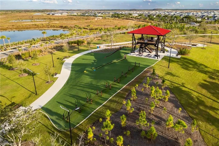 Aerial view of a park and a nearby body of water