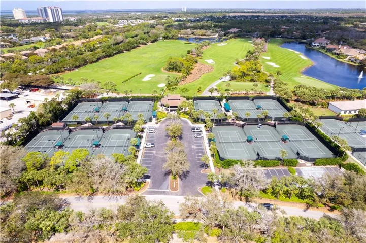 Bird's eye view of a nearby body of water and a golf course