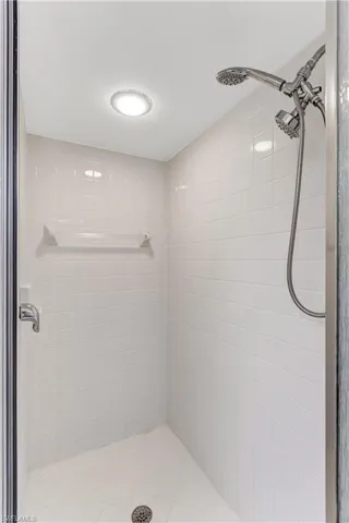 Bathroom featuring a shower stall