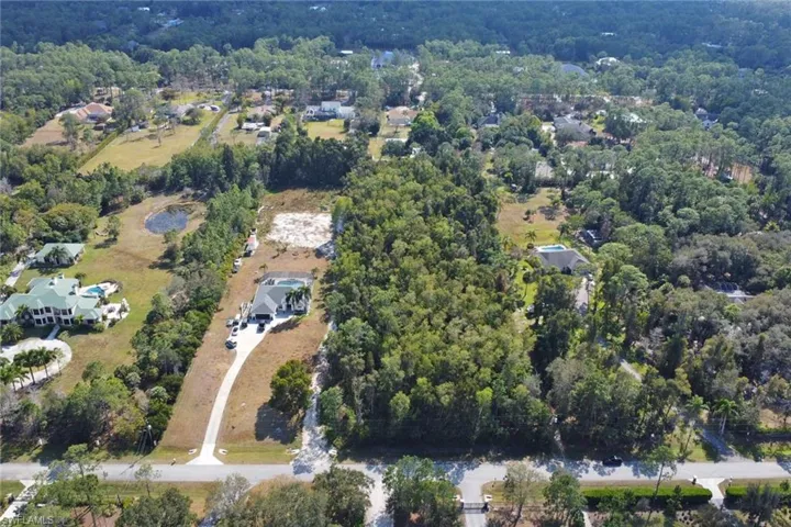 View of property location with a forest